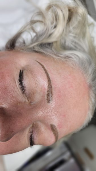 Fair haired mature client brows